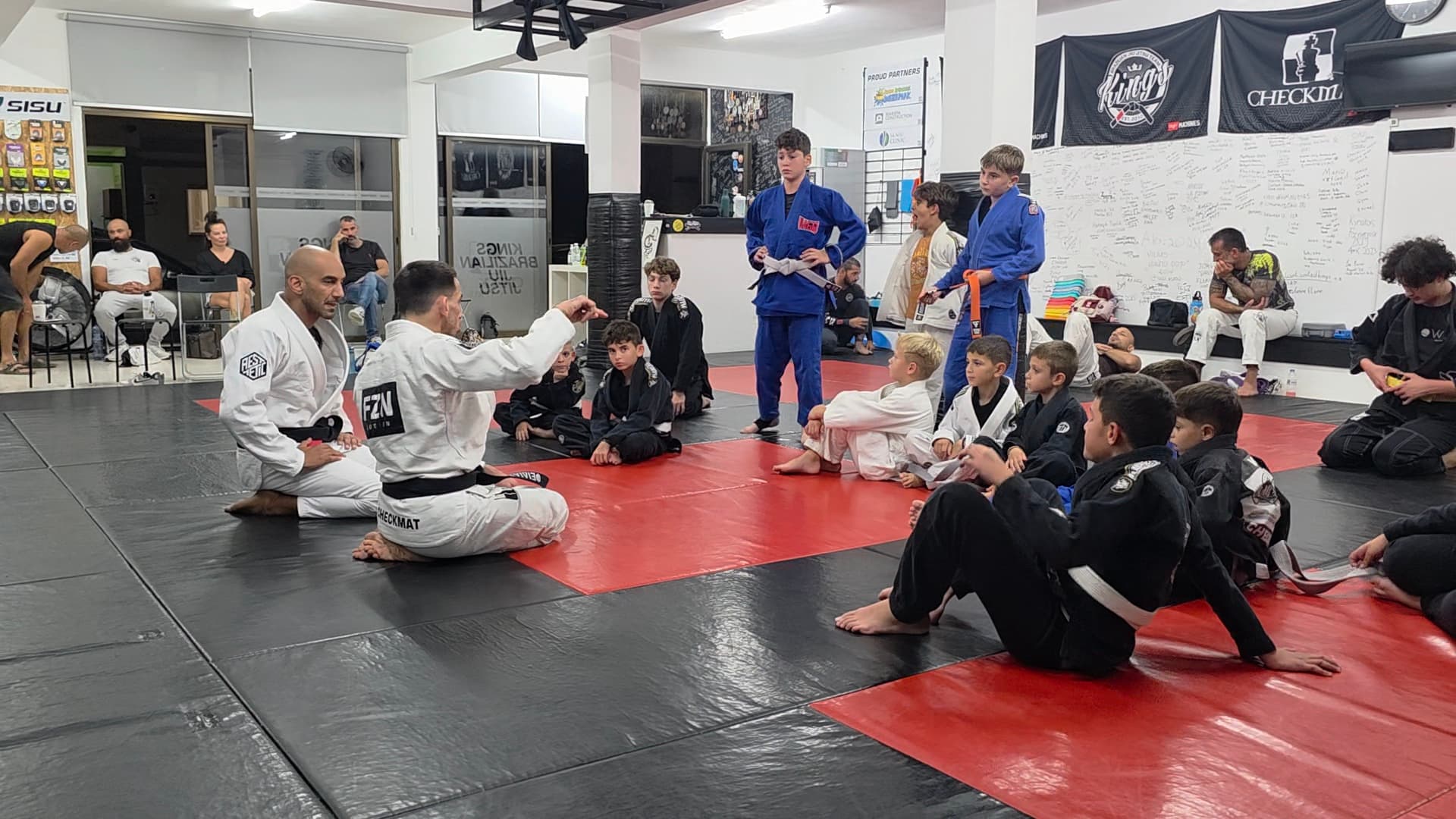 Our little champions from the BJJ gym in Paphos, Cyprus, standing proudly as a team, symbolizing the spirit of youth empowerment in BJJ.