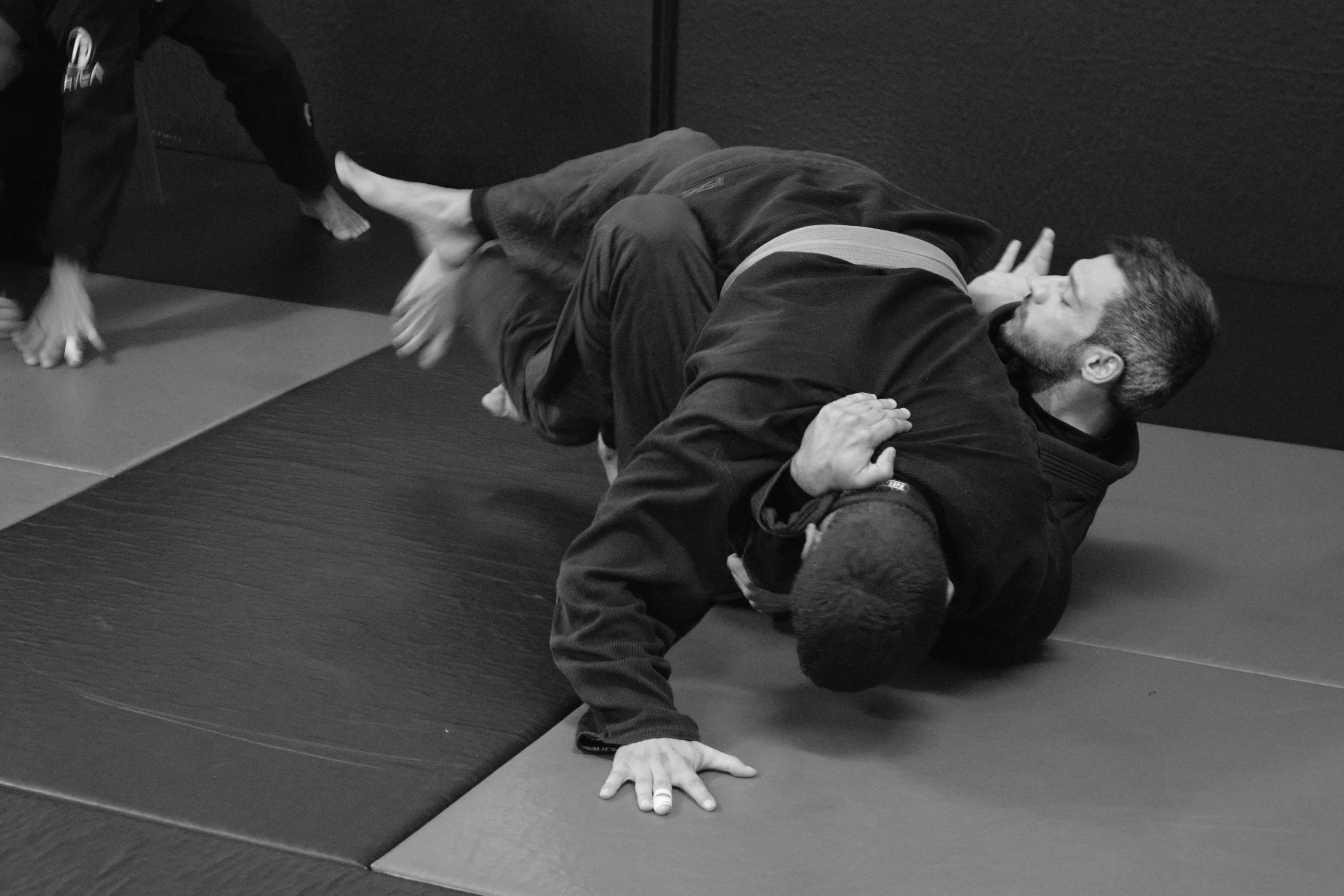 Female BJJ practitioner demonstrating a self-defense technique at our BJJ academy in Paphos, Cyprus.